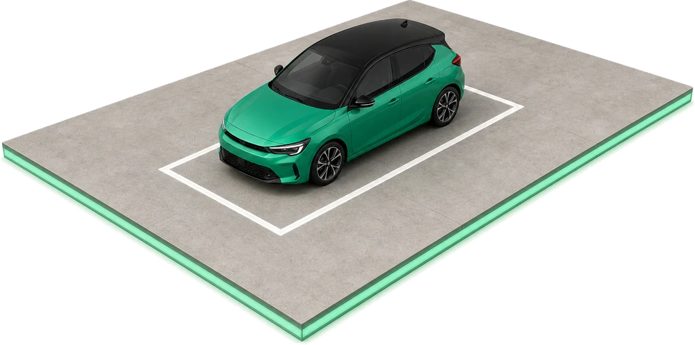 Une place de parking matérialisée au sol, avec une voiture stationnée dessus